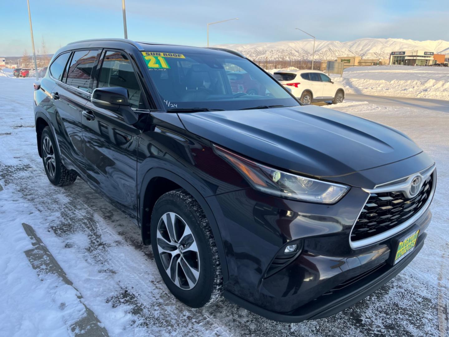 2021 Black Cherry /black leather Toyota Highlander XLE AWD V6 (5TDGZRBH8MS) with an 3.5L V6 DOHC 24V engine, 6A transmission, located at 1960 Industrial Drive, Wasilla, 99654, (907) 274-2277, 61.573475, -149.400146 - Photo#7